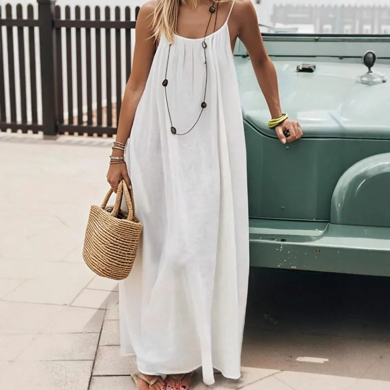 Vestido Feminino Casual de Verão 2026 com Alça Fina e Caimento Solto, Cor Sólida, para Férias e Lazer em Casa